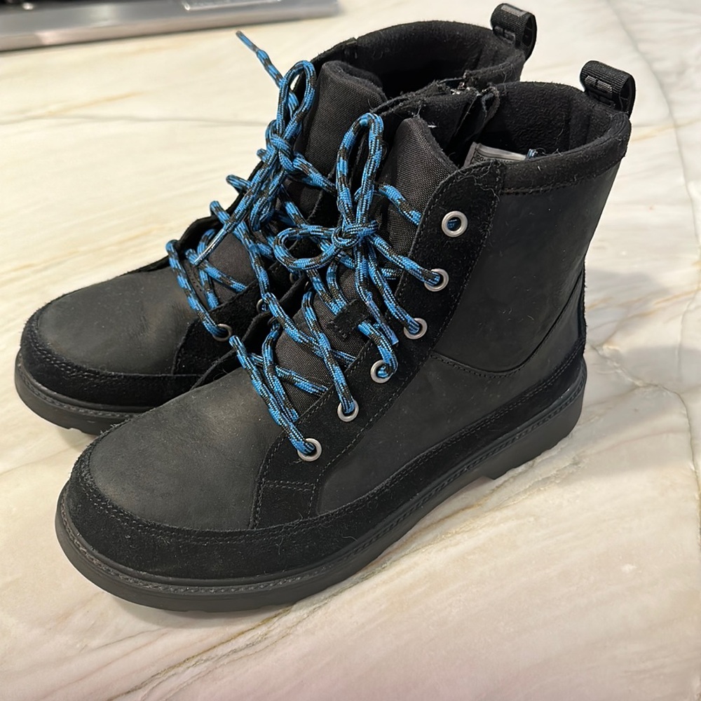 Boys Ugg boots, worn once. Did not clean soles to show wear.